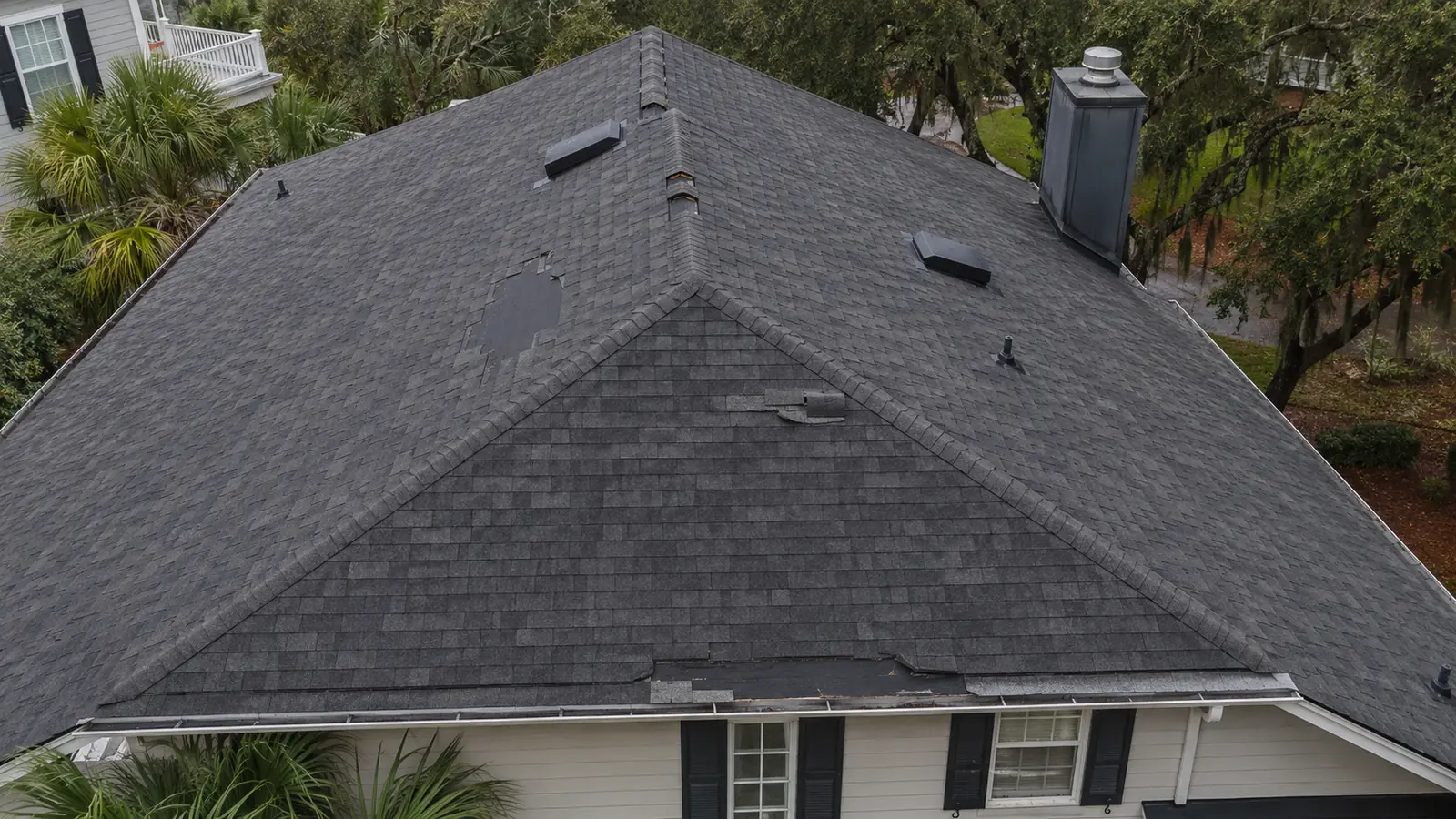 hurricane roof damage multiple slopes aerial