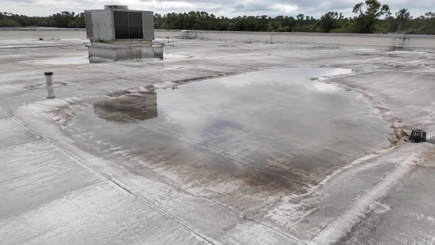 Ponding Water on Low-Slope Roofs in the Lowcountry: Why It Matters 1 image 6a75dc2960cb1